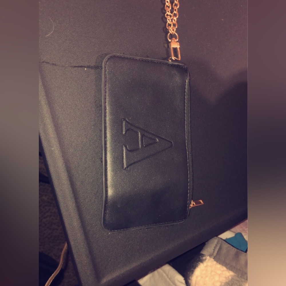 Small Wallet that is easy to conceal. Has the letter “A” embroidered on it